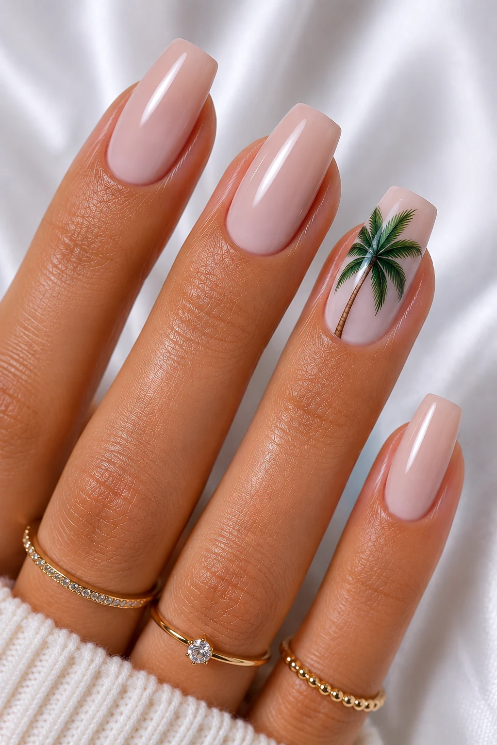 Tropical Palm Accent Nails — Cool Summer Nails style outfit, worn by a stylish woman