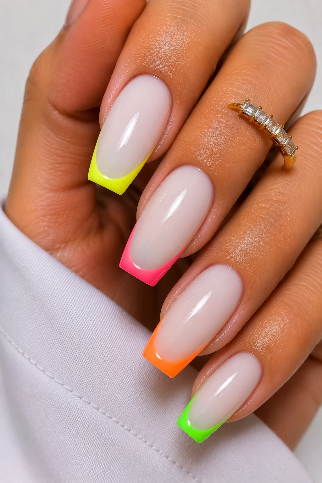 Milky Neon French Tips — holiday nail ideas summer style outfit, worn by a stylish woman