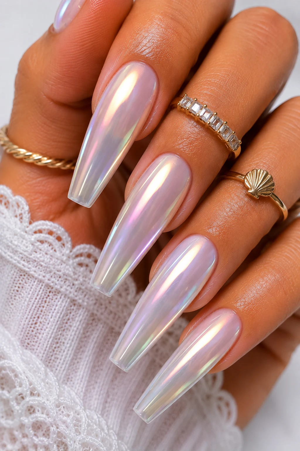 Pearl Chrome Glow — holiday nail ideas summer style outfit, worn by a stylish woman