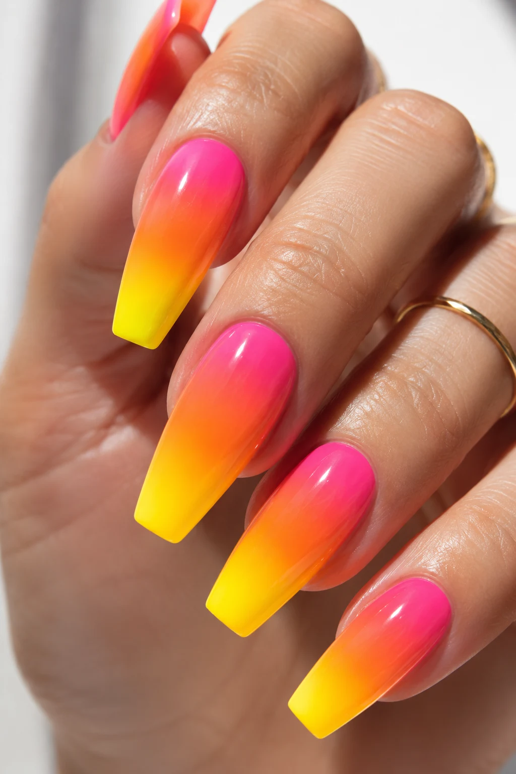 Neon Sunset Ombre — Hot Summer Nails style outfit, worn by a stylish woman