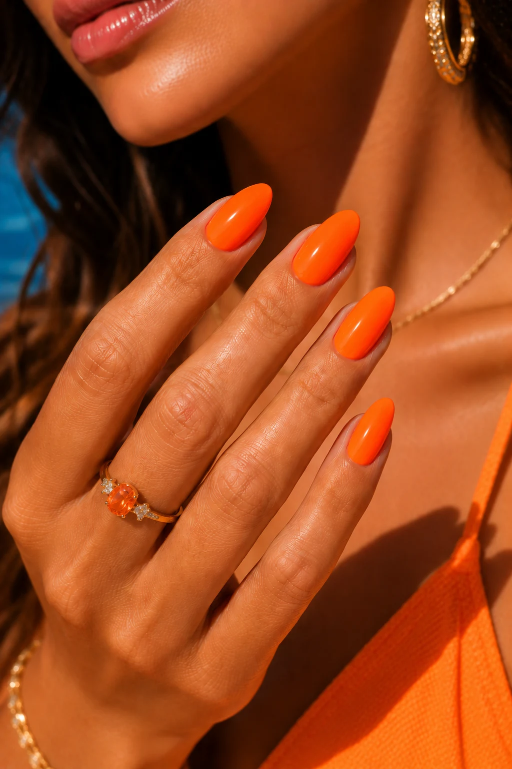 Neon Orange Poolside Pop — orange nail ideas summer style outfit, worn by a stylish woman
