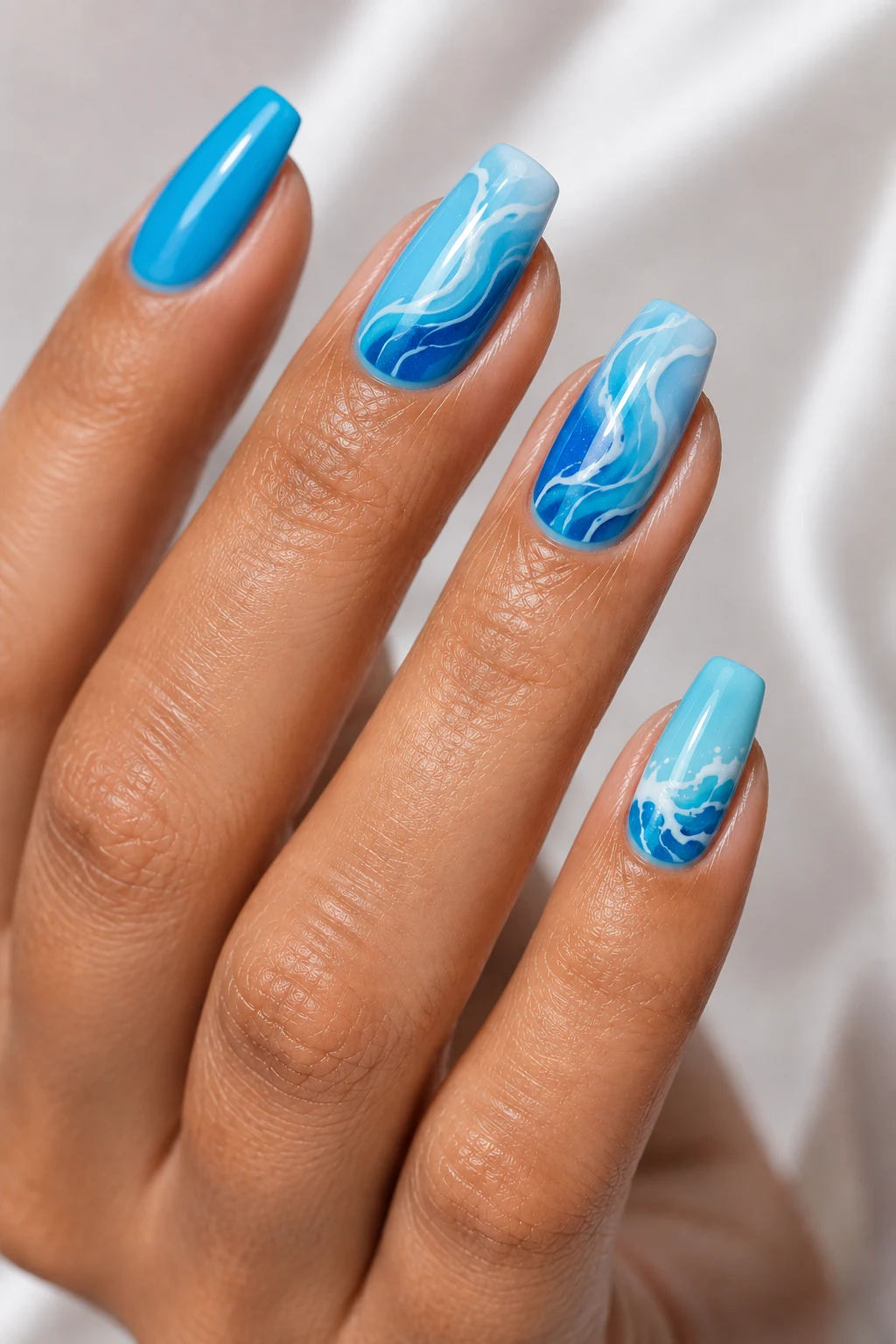 Ocean Wave Blue Nails — Popular Summer Nails style outfit, worn by a stylish woman