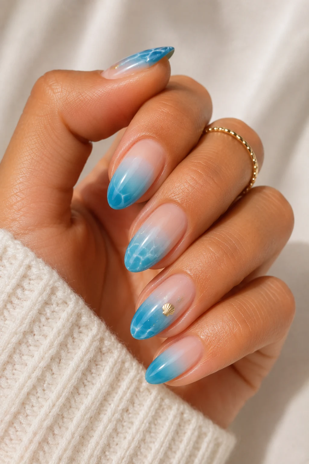 summer nails designs — Ocean Blue Summer Nails Designs Inspired by Beach Days — summer nails designs style outfit, worn by a stylish woman