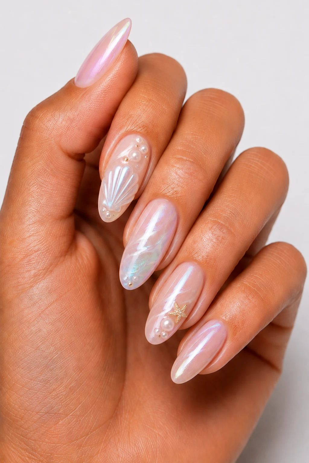 Chrome Seashell Glow Summertime Nails Design — summertime nails design style outfit, worn by a stylish woman