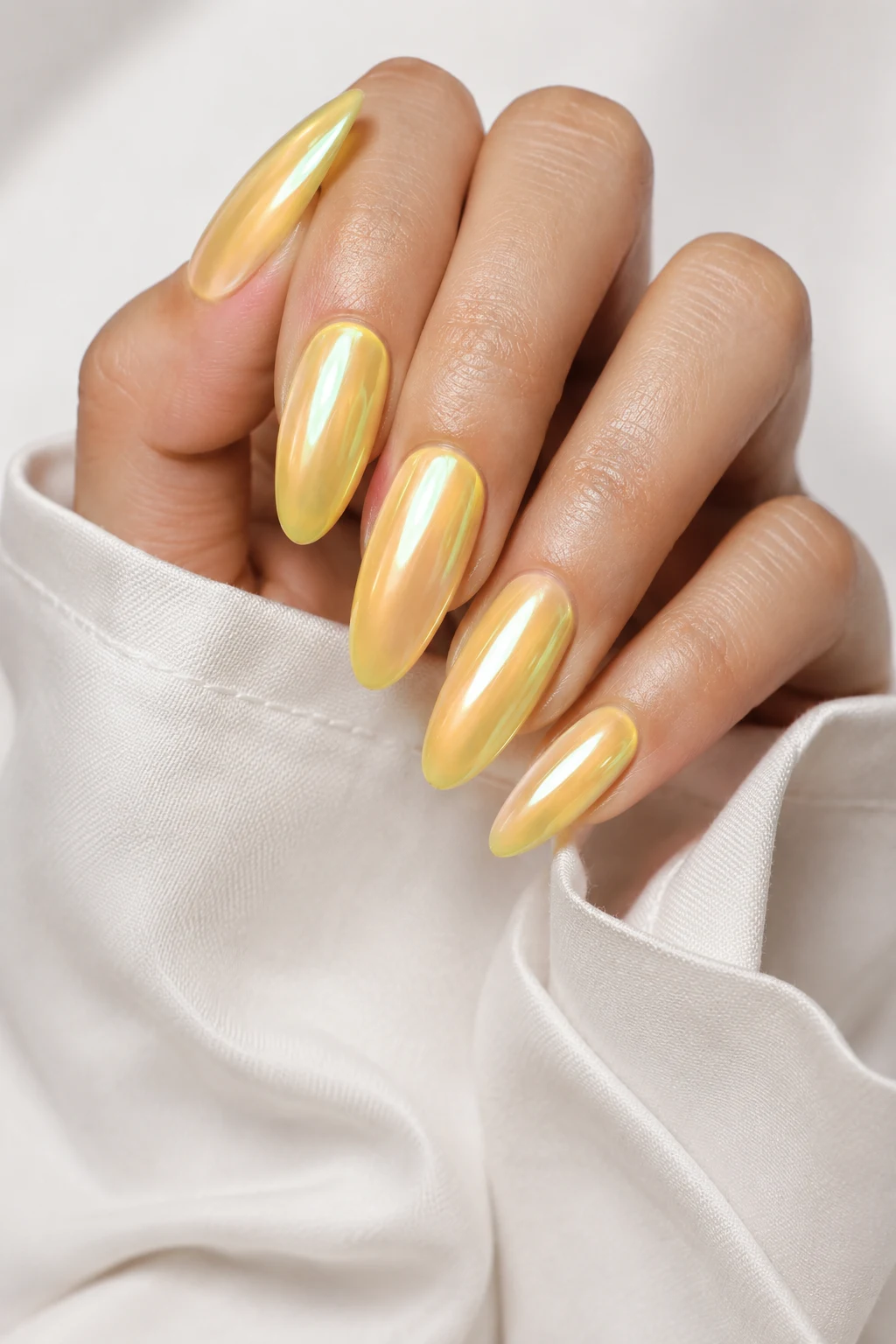 Glazed Lemon Chrome — Trendy Nails For Summer style outfit, worn by a stylish woman