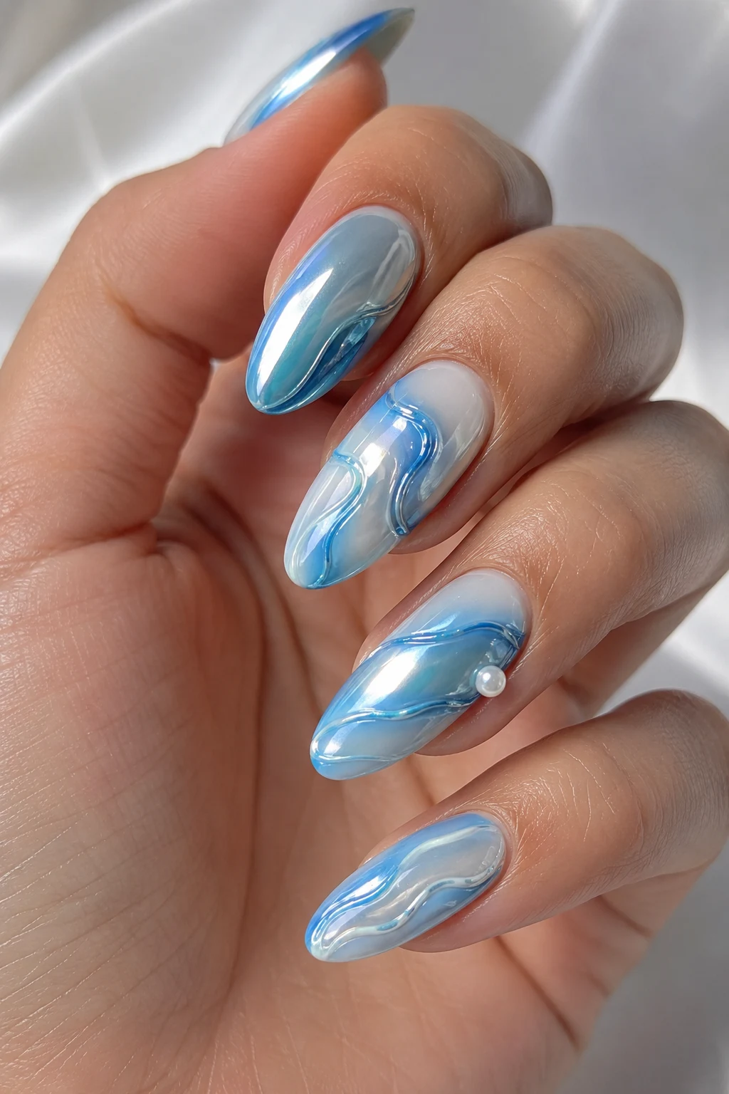 Ocean Chrome Waves — cool summer nails 2026 style outfit, worn by a stylish woman