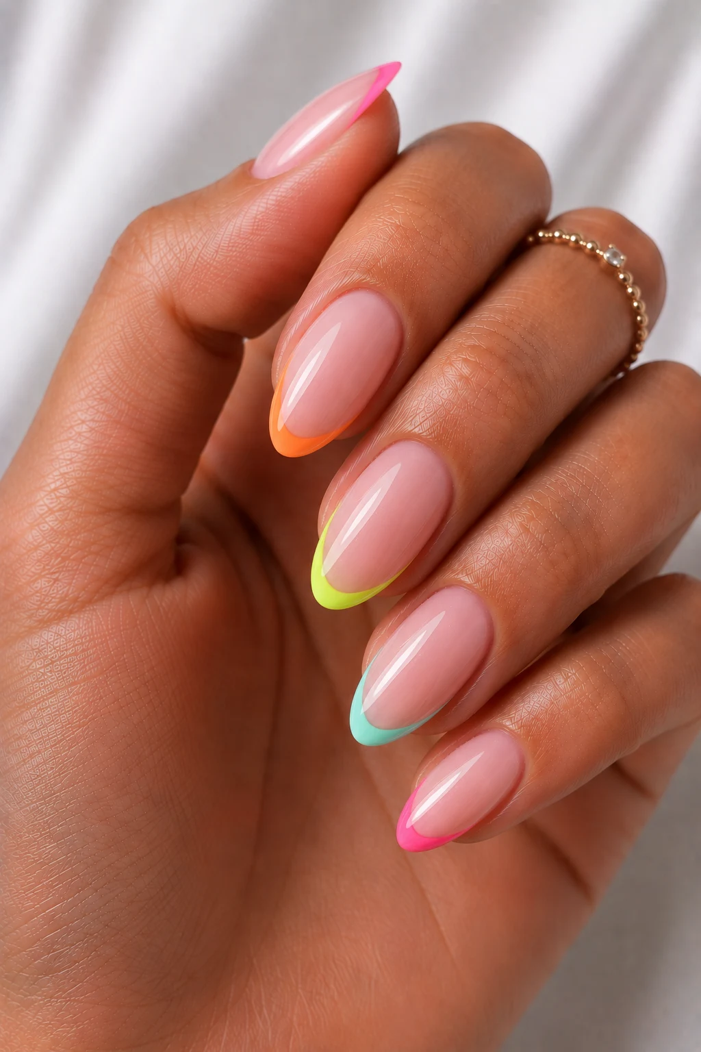 Cool Summer Nails Almond With Neon French Tips — cool summer nails almond style outfit, worn by a stylish woman