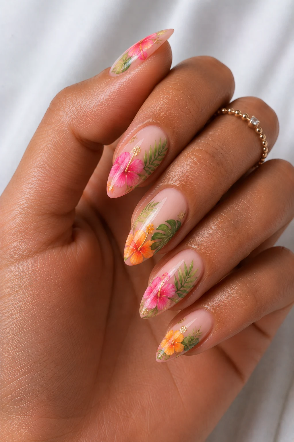 Tropical Hibiscus Paradise — cool summer nails almond style outfit, worn by a stylish woman