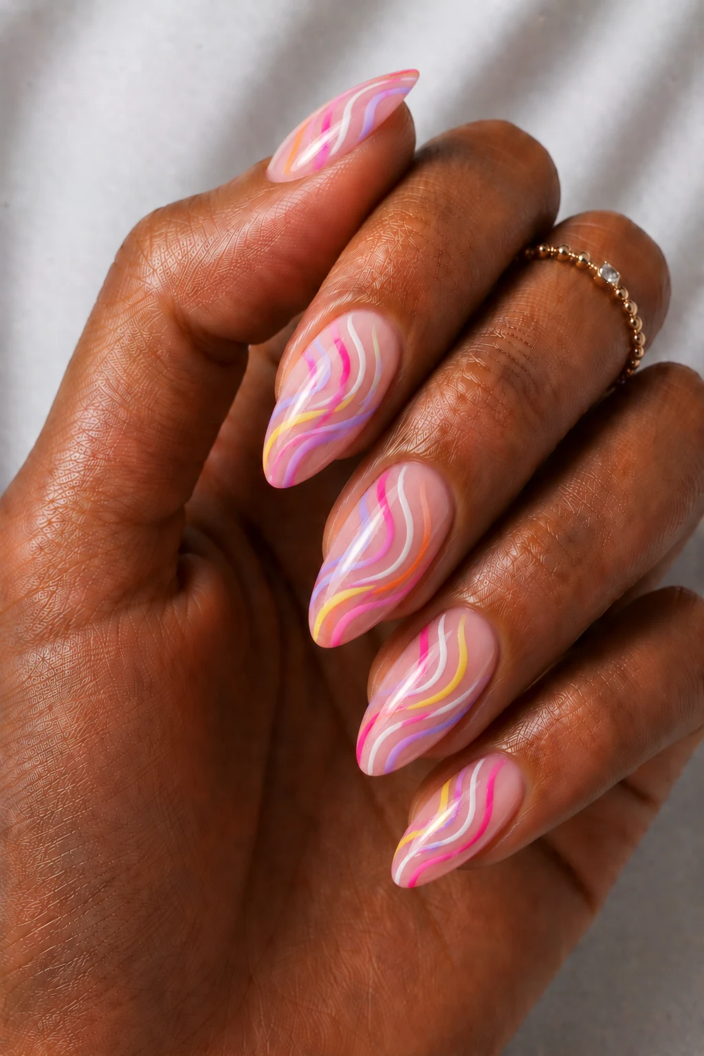 Cool Summer Nails Pink Rainbow Swirls — cool summer nails pink style outfit, worn by a stylish woman