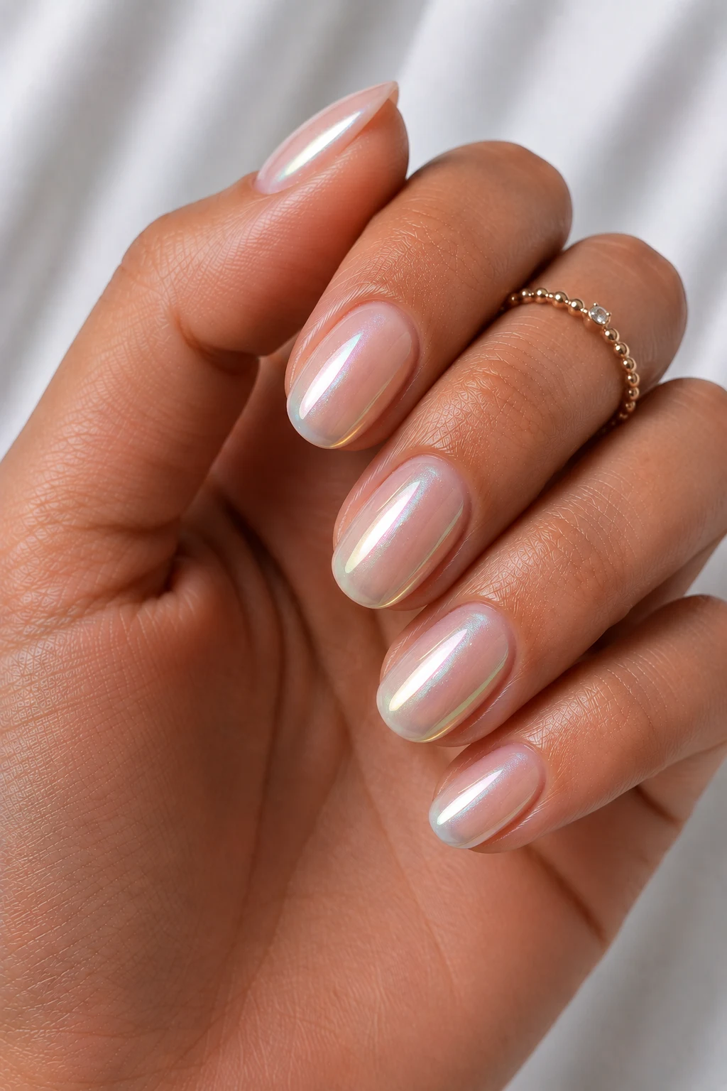 Cool Summer Nails Short Pearl Glaze — cool summer nails short style outfit, worn by a stylish woman