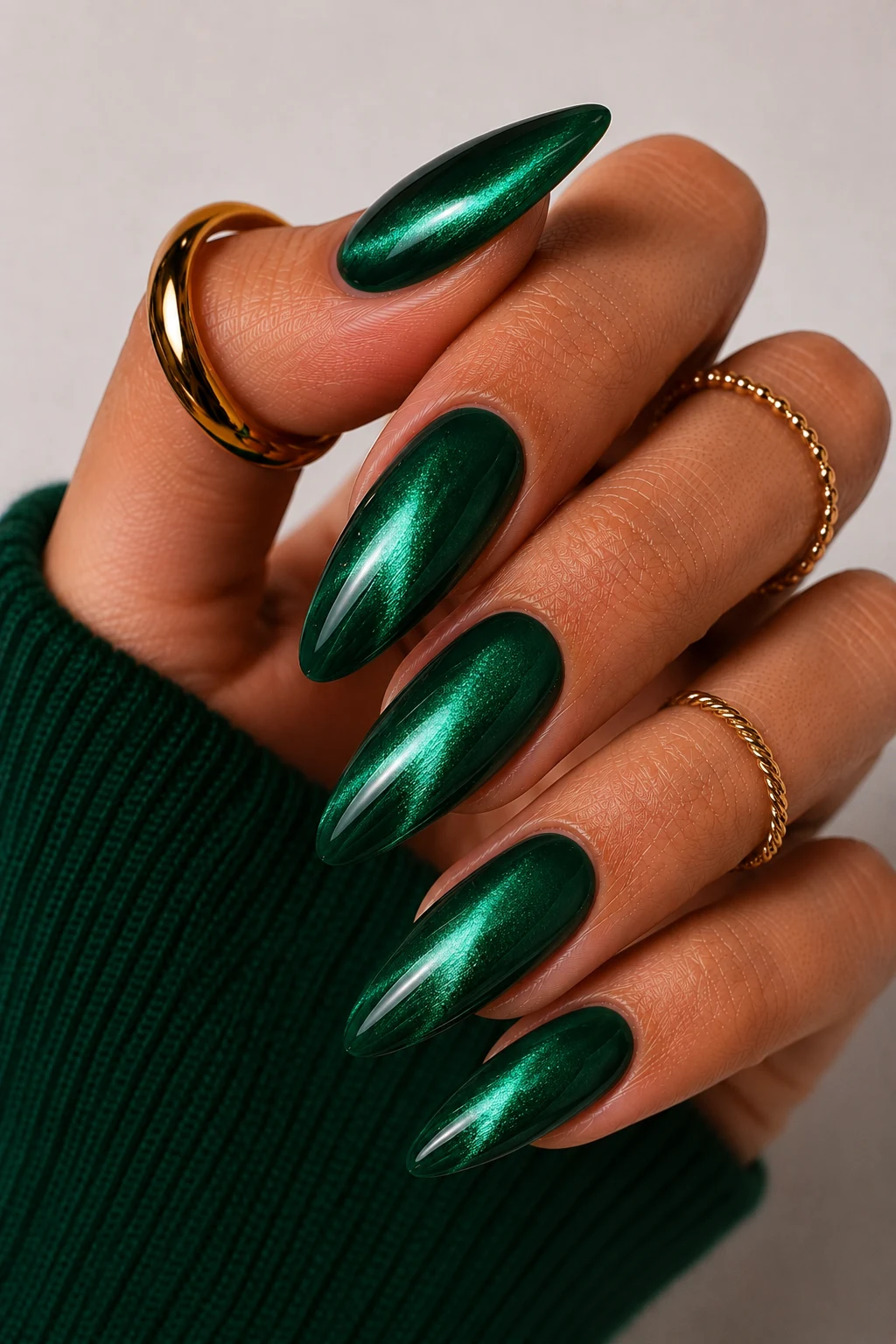 Emerald Chrome Cat-Eye Magic — emerald green nail ideas style outfit, worn by a stylish woman
