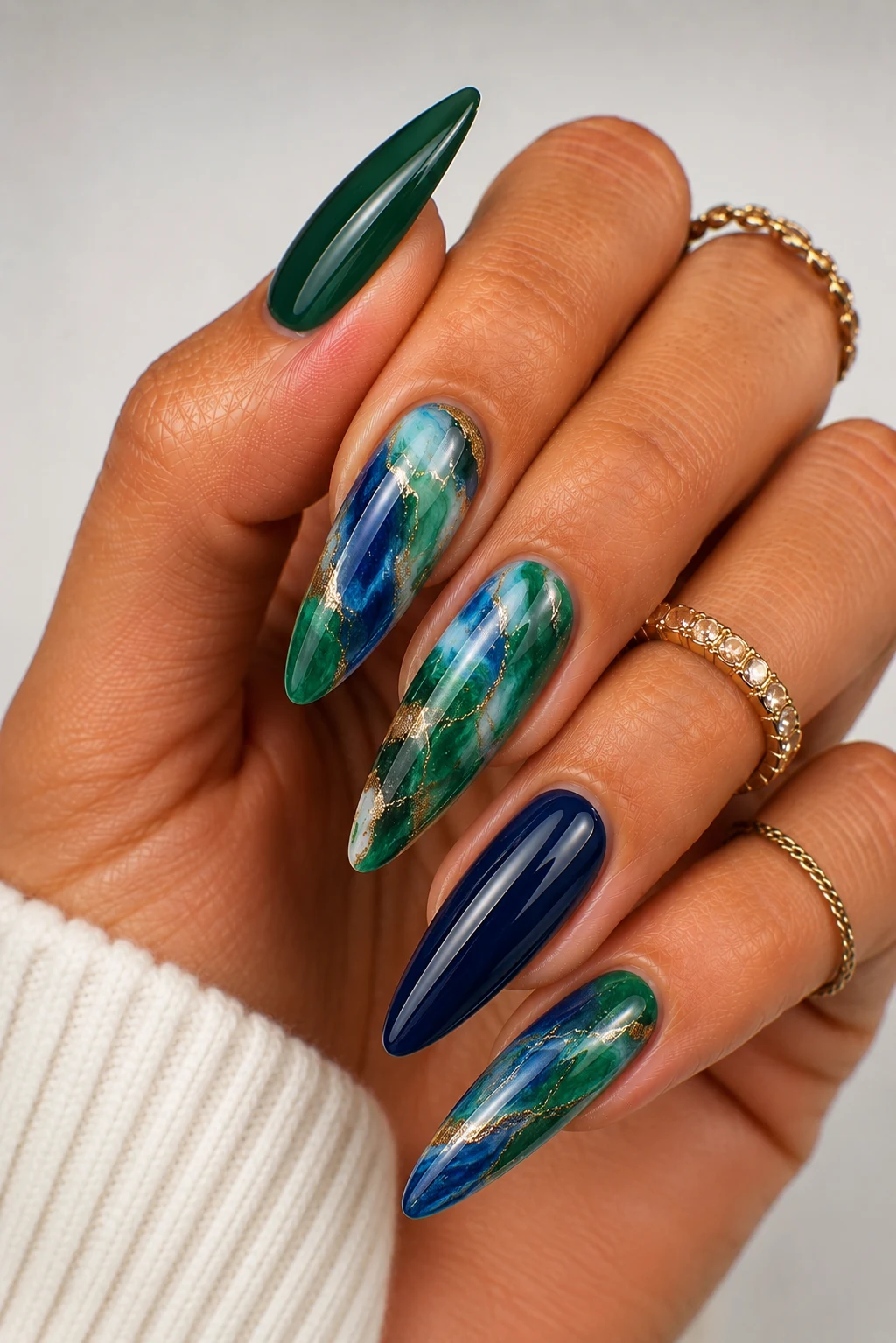 Introduction — green and blue nail ideas style outfit, worn by a stylish woman