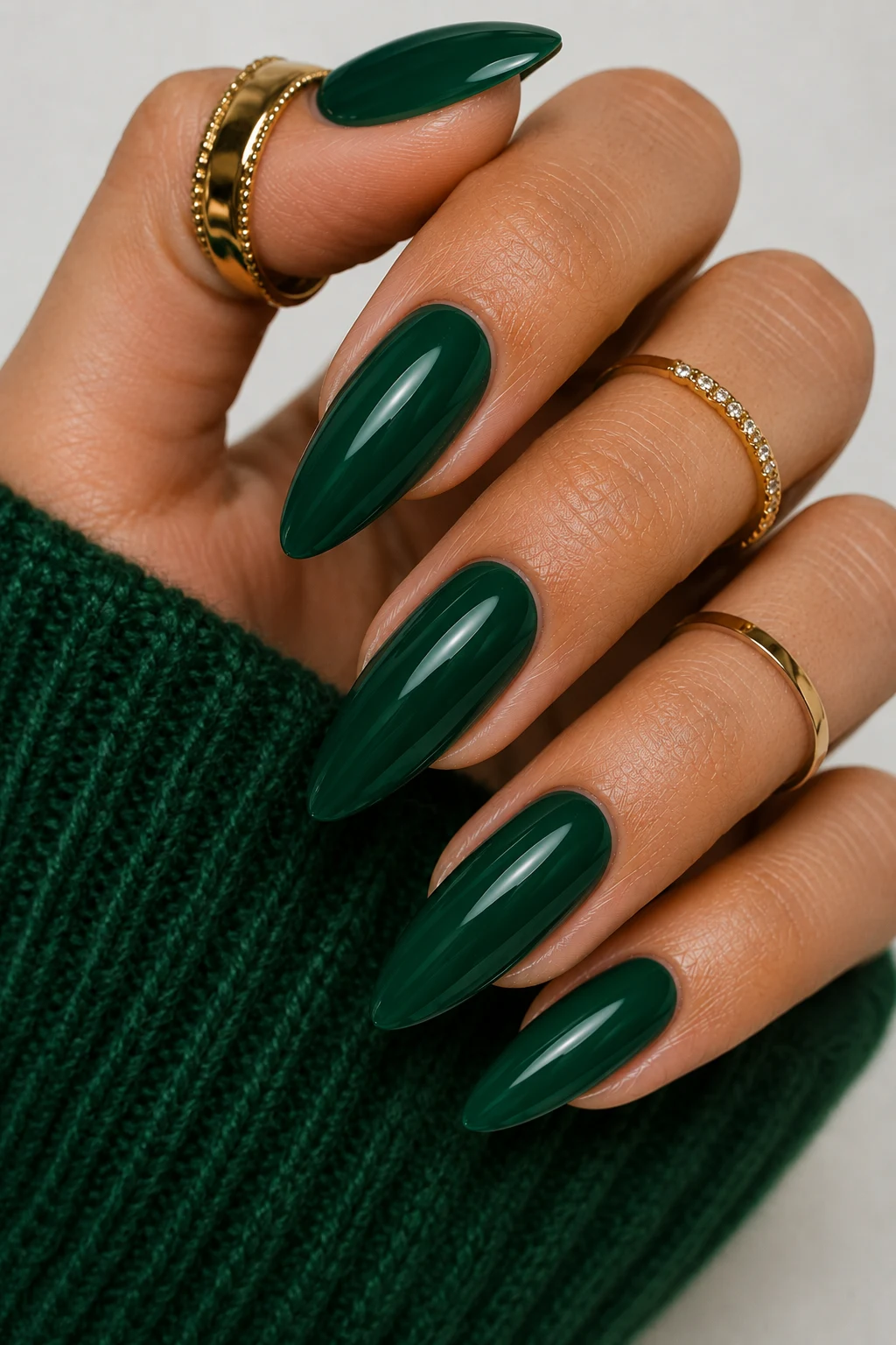 Classic Emerald Holiday Elegance — green christmas nail ideas style outfit, worn by a stylish woman
