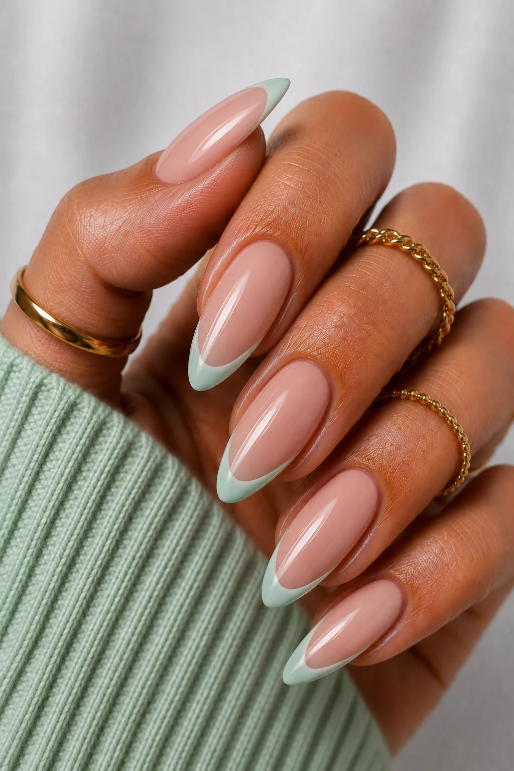 Modern Mint French Tips — mint green nail ideas style outfit, worn by a stylish woman
