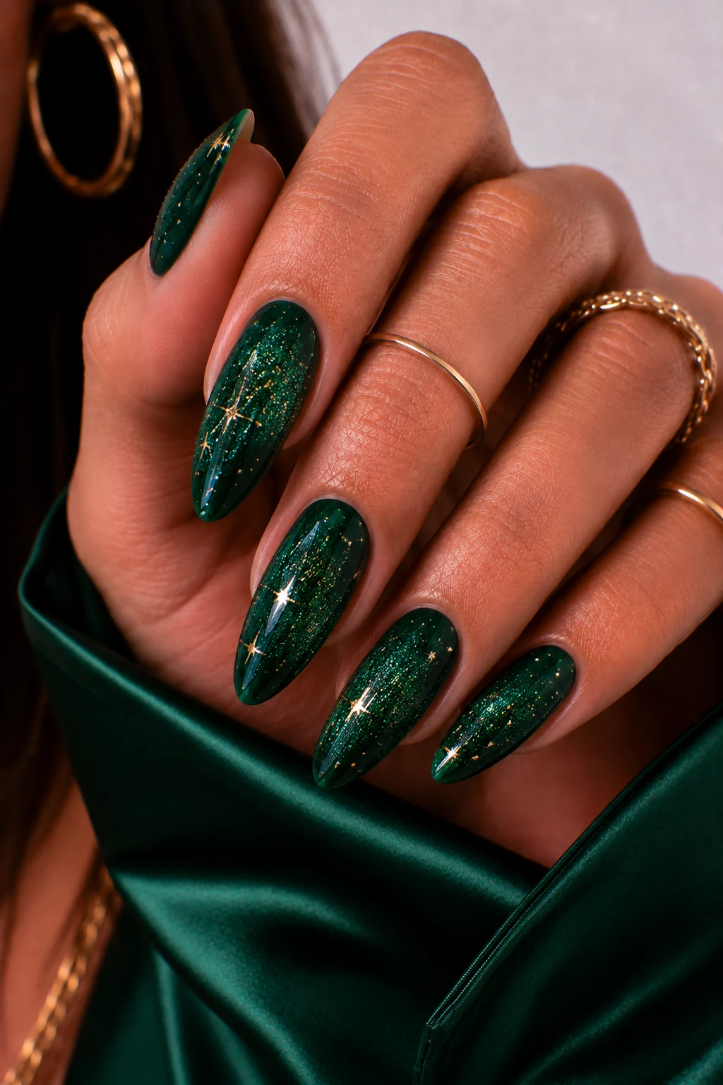 Glittering Dark Green Galaxy Nails — nail ideas dark green style outfit, worn by a stylish woman