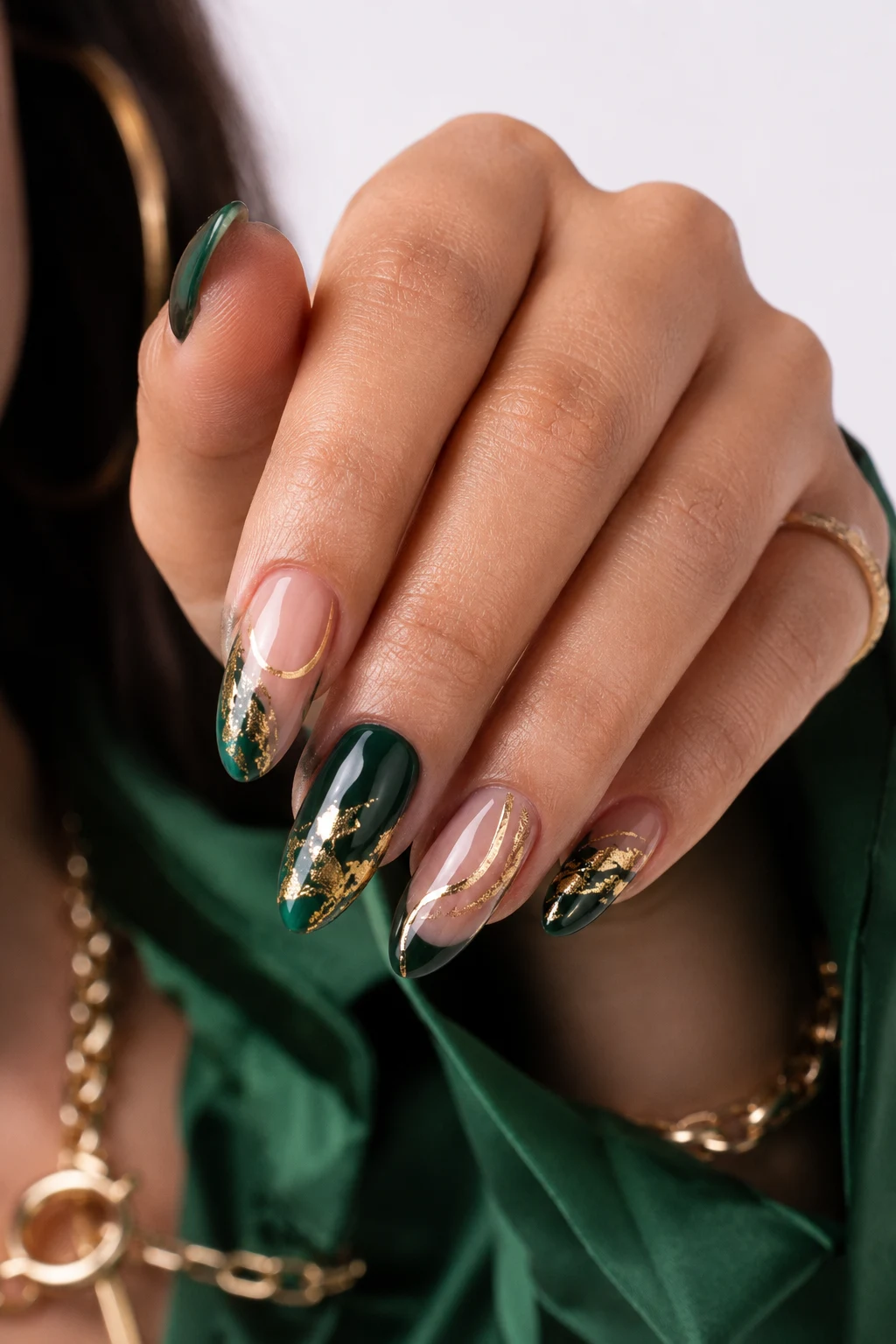 Introduction — nail ideas green and gold style outfit, worn by a stylish woman