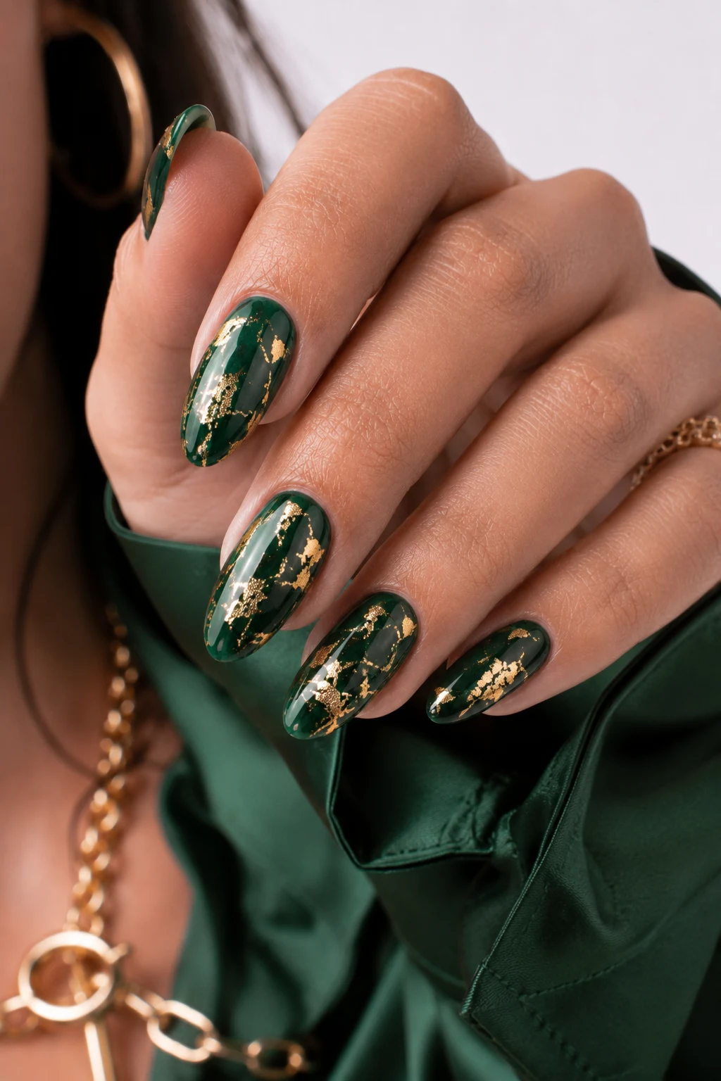 Gold Foil Forest Fantasy — nail ideas green and gold style outfit, worn by a stylish woman