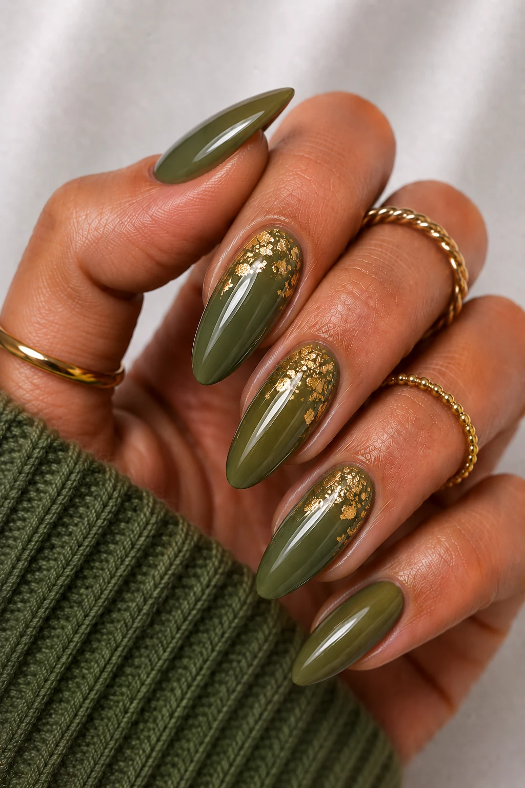 Olive Green Nail Ideas With Gold Foil Magic — olive green nail ideas style outfit, worn by a stylish woman
