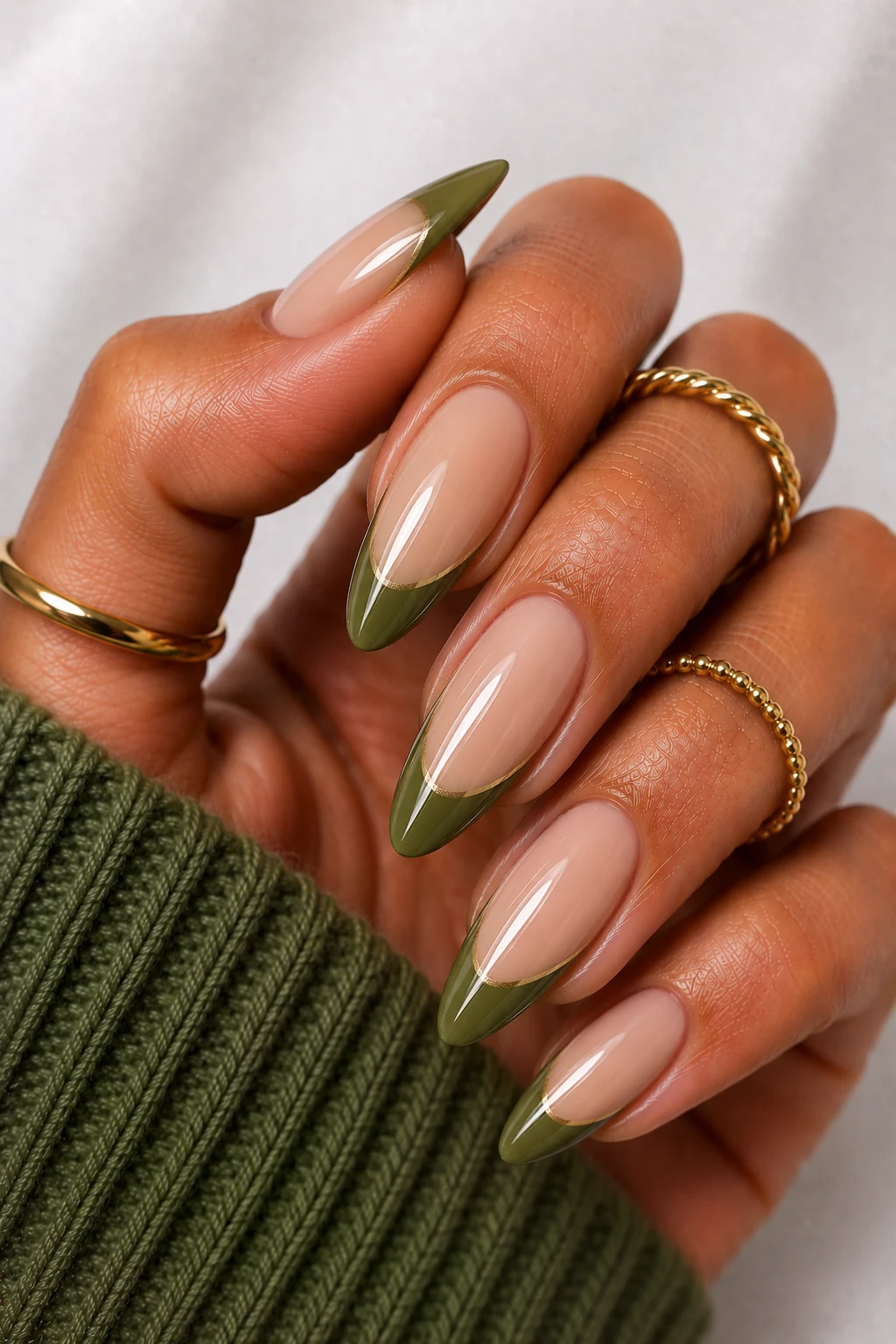 Modern Olive French Tips — olive green nail ideas style outfit, worn by a stylish woman