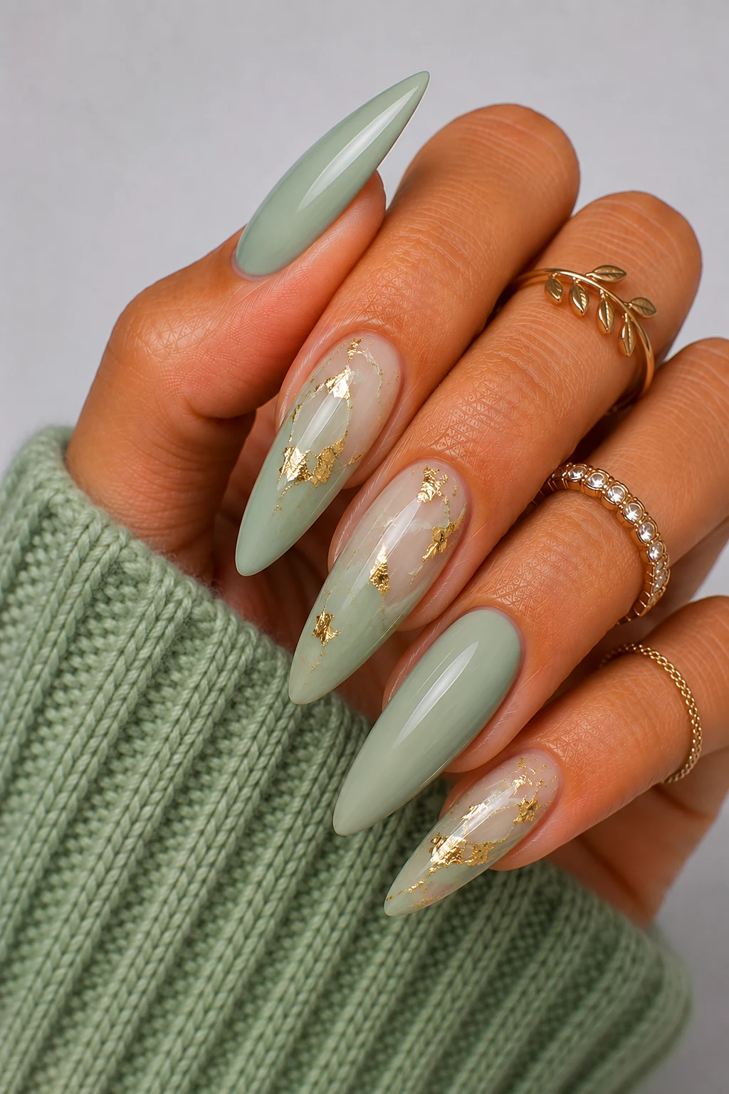 Pale Green Nail Ideas with Gold Foil Accents — pale green nail ideas style outfit, worn by a stylish woman