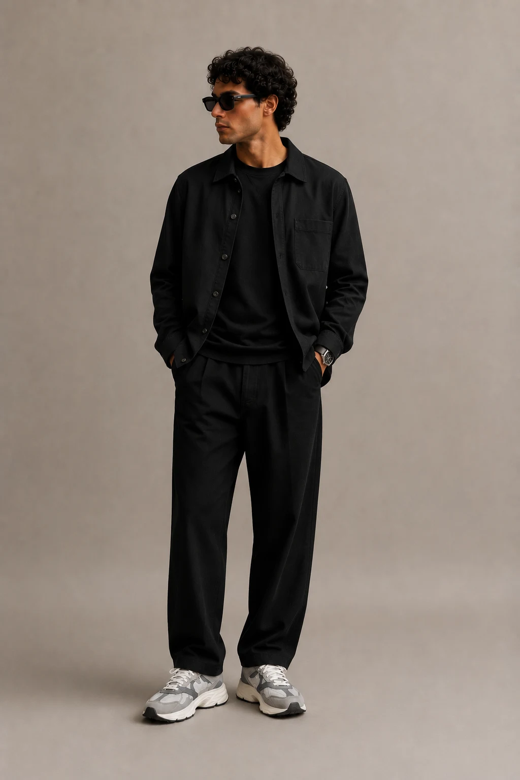 The Monochrome Black Statement — outfits for men new balance 9060 style outfit, worn by a stylish man