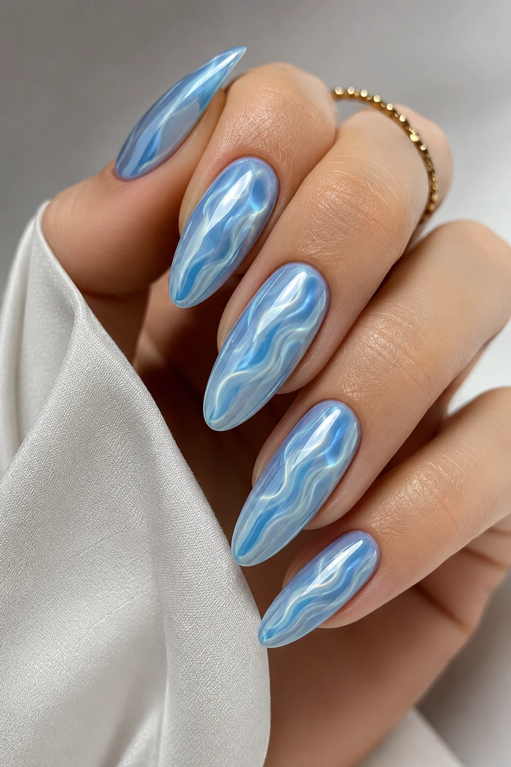 Ocean Wave Baby Blue Chrome Nails Almond — baby blue chrome nails almond style outfit