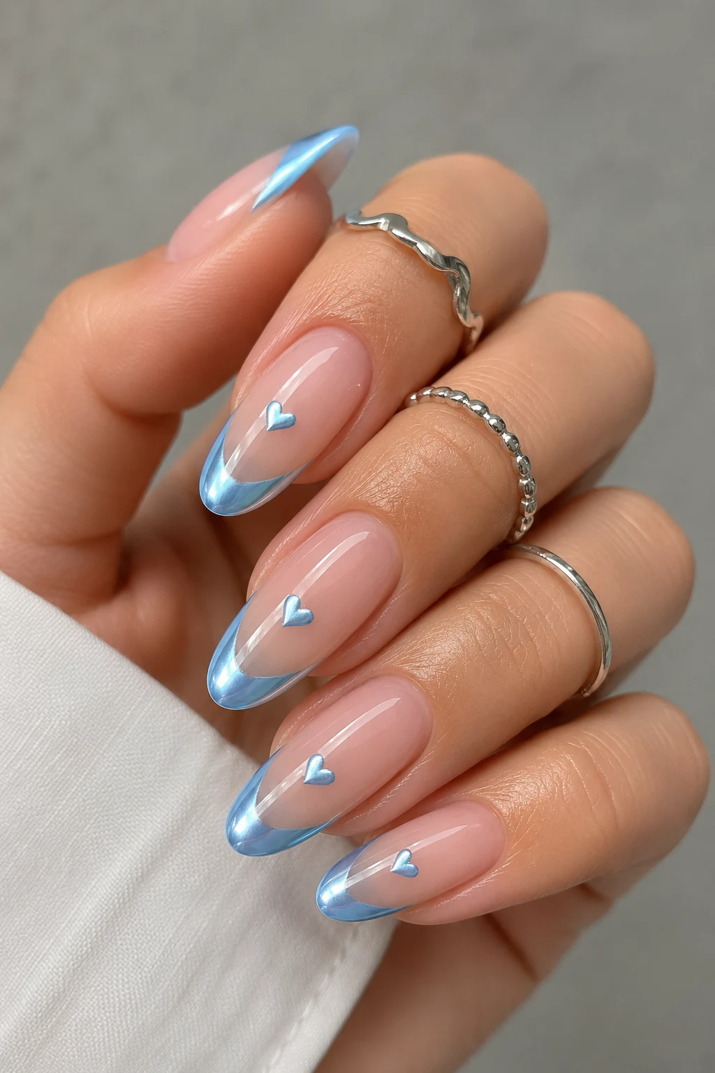 Chrome French Tips with Blue Heart Details — baby blue chrome nails with design style outfit