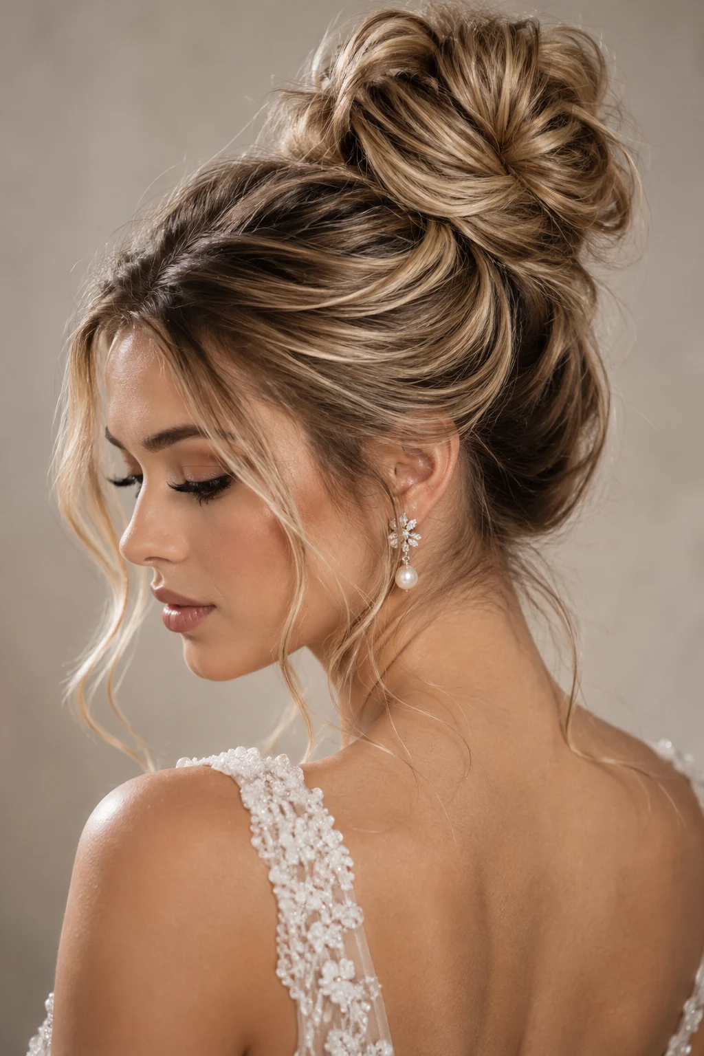 Textured High Bun — elegant bridal hairstyles style outfit
