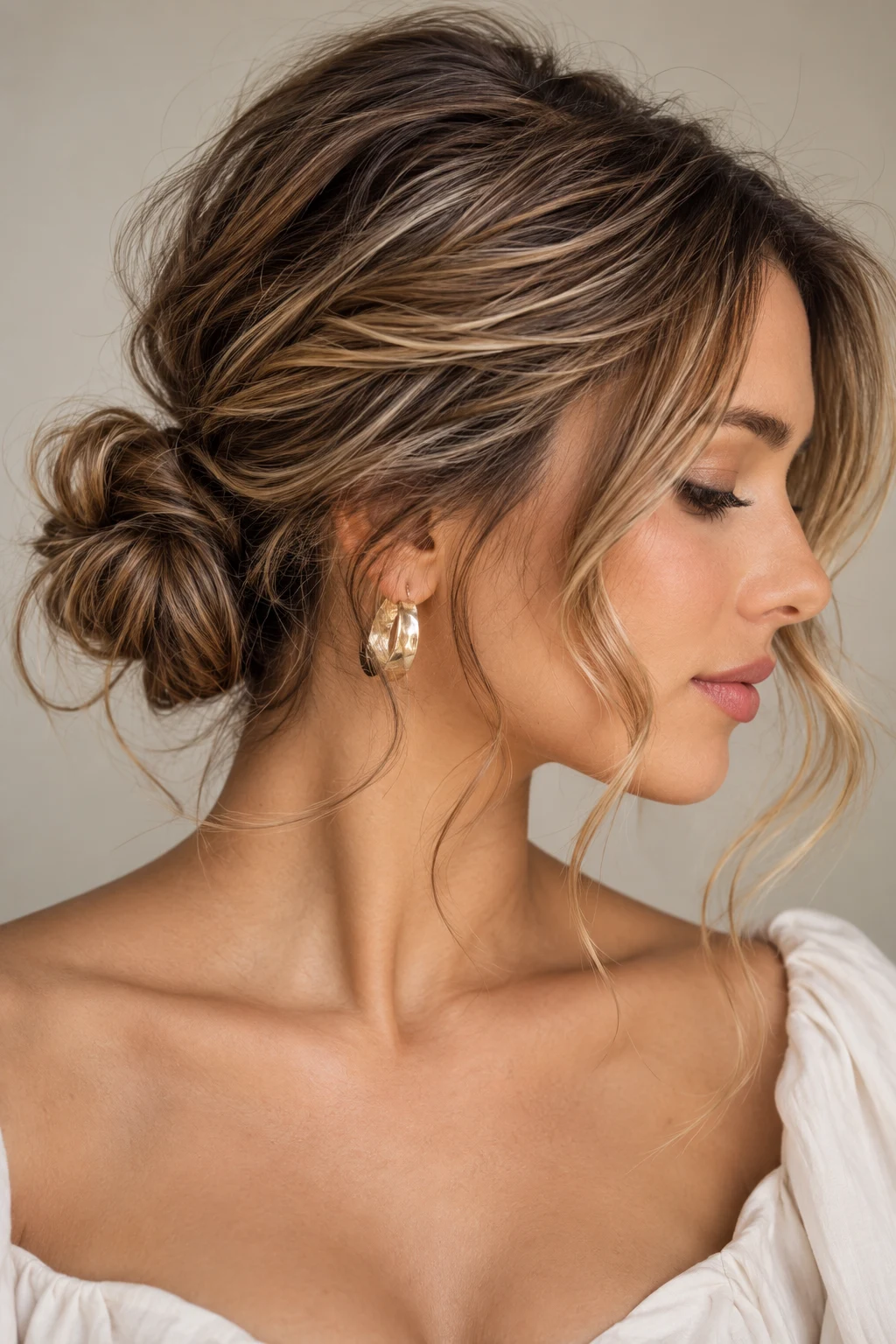 Low Loose Mini Bun — loose hairstyles for short hair style outfit