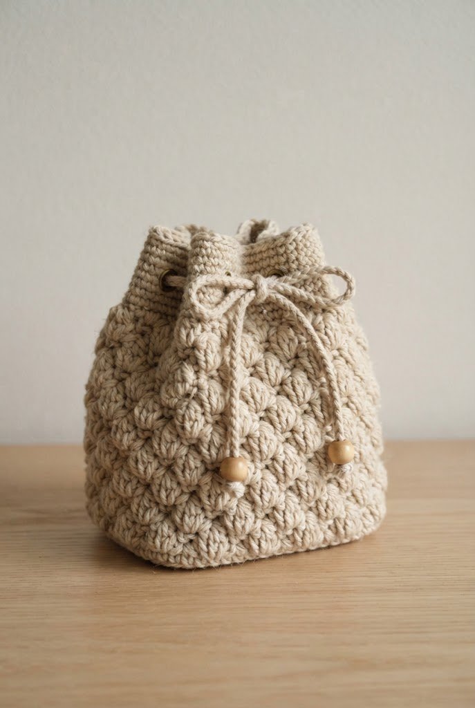The Drawstring Pineapple Stitch Pouch — crochet boho bag pattern style outfit